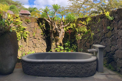 Inspiration for a tropical bathroom remodel in Other