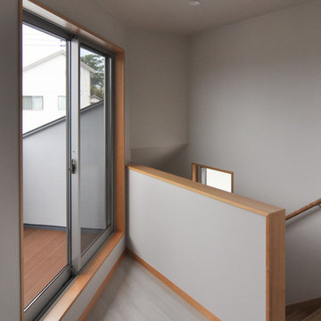 室内と庭空間 敷地を一体化する三角形プラン