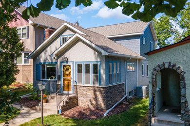 Example of an arts and crafts two-story exterior home design in Minneapolis