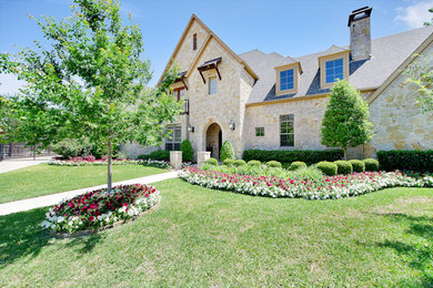 Huge elegant two-story exterior home photo in Dallas