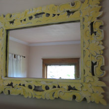 Mirror above fireplace