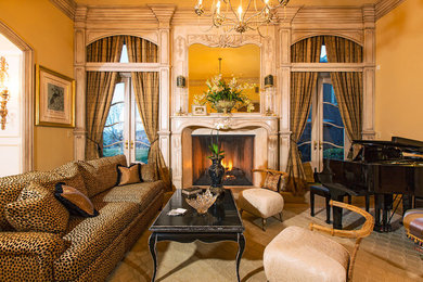 Inspiration for a mid-sized timeless formal and open concept travertine floor living room remodel in Santa Barbara with beige walls, a standard fireplace, a stone fireplace and no tv