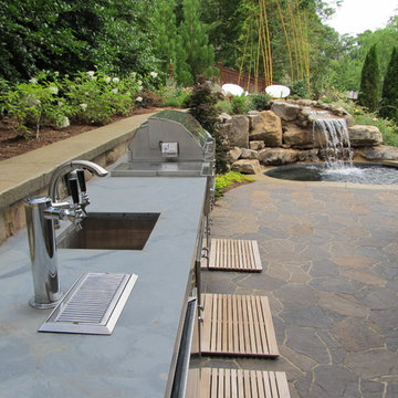 Outdoor Kitchen, Waterfall, Spa, and Paver Patio
