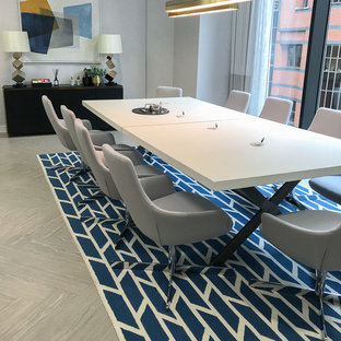 Idéer för ett mellanstort modernt arbetsrum, med grå väggar, vinylgolv, ett fristående skrivbord och grått golv