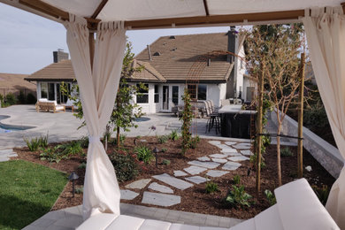 Home design - large transitional home design idea in Orange County
