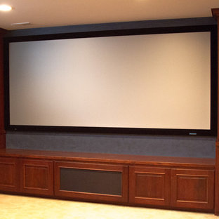 Inspiration for a mid-sized timeless enclosed carpeted home theater remodel in Columbus with blue walls and a projector screen