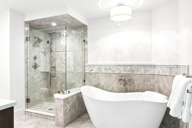 Bathroom - mid-sized traditional master gray tile and porcelain tile ceramic tile, gray floor and double-sink bathroom idea in Other with raised-panel cabinets, dark wood cabinets, a one-piece toilet, white walls, an undermount sink, quartzite countertops, a hinged shower door, gray countertops and a built-in vanity