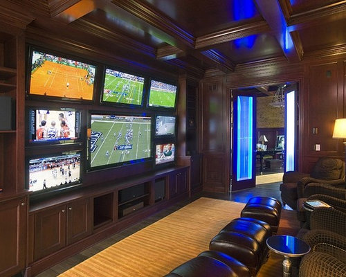 living room with multiple tvs