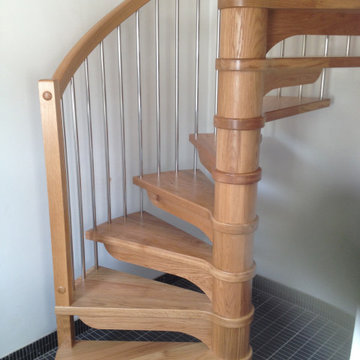 Small Oak spiral staircase for a seafront apartment in Falmouth.
