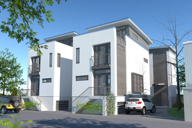 Ejemplo de fachada de casa blanca y gris minimalista de tamaño medio de tres plantas con revestimientos combinados, tejado plano y tejado de metal