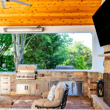 Pool Side Covered Patio with Fireplace and Bar Area
