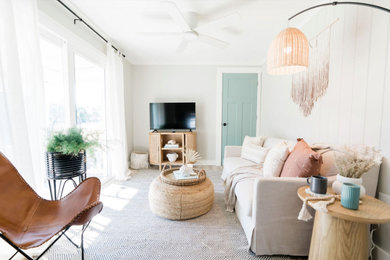 Living room - coastal living room idea in Other