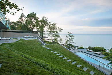 Inspiration for a large modern hillside landscaping in Chicago.
