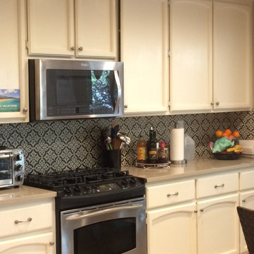 Same Cabinets, New Counter and Back Splash Transform the Kitchen!