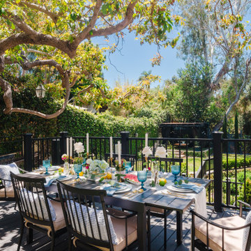 Outdoor Patio Dining Area with Garden Views and Mature Shade Tree
