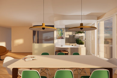 La salle à manger est séparée de la cuisine par un bar muni de rangements