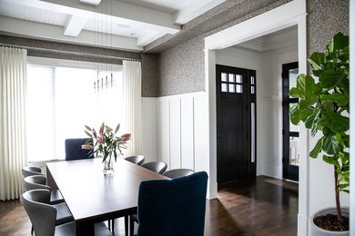 Inspiration for a large traditional separate dining room in Calgary with metallic walls and dark hardwood floors.