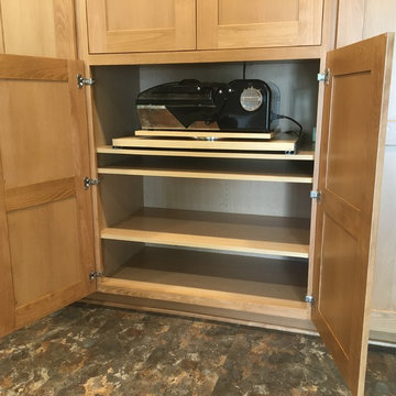 Shrink wrap unit on lazy susan Glide-Out tray
