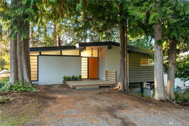 Example of a 1960s exterior home design in Seattle