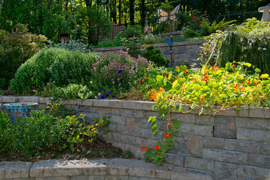 Design ideas for a rustic front yard concrete paver driveway in Boston.