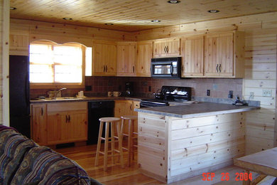 Example of a mountain style kitchen design in Other