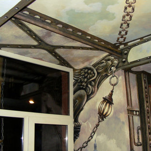 Aménagement d'un escalier droit de taille moyenne avec des marches en acrylique, des contremarches en béton, un garde-corps en métal et un mur en parement de brique.