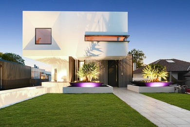 Photo of a contemporary home design in Melbourne.