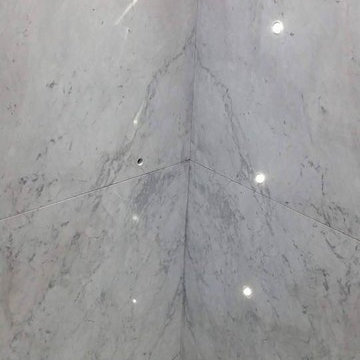 Carrara marble bathroom by ADL Tile and Stone