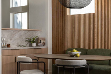 Danish vinyl floor, beige floor and wall paneling breakfast nook photo in Sacramento with beige walls