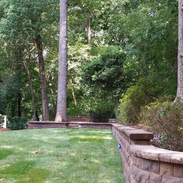 Walkways, retaining walls, patio with fire pit!
