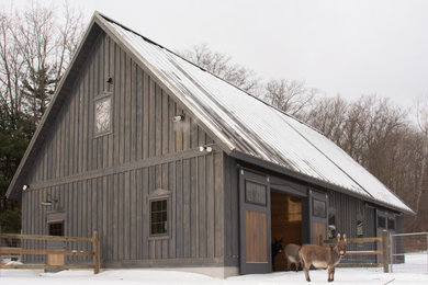 Rustic exterior home idea in Other