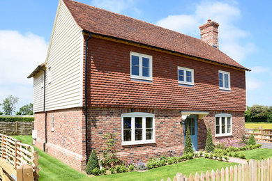 Photo of a medium sized farmhouse home in Kent.