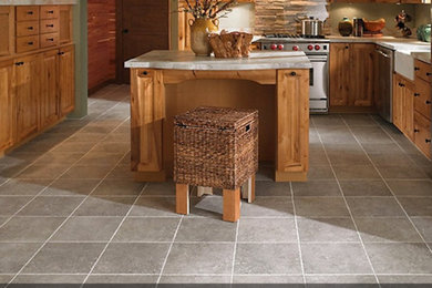 Inspiration for a mid-sized arts and crafts kitchen in Seattle with ceramic floors and grey floor.