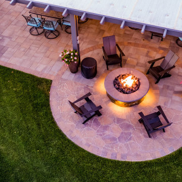 Backyard Patio with Spacious Lawn & Dry Stream Bed
