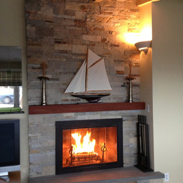 Living room fireplace renovation using ledgestone