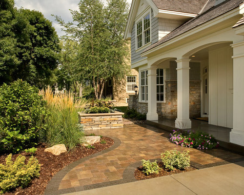 A Front Yard Landscape With a Creative Entry