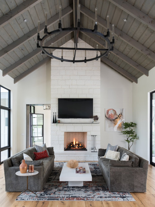 75 Farmhouse Living Room with a Stone Fireplace Design Ideas - Stylish ...