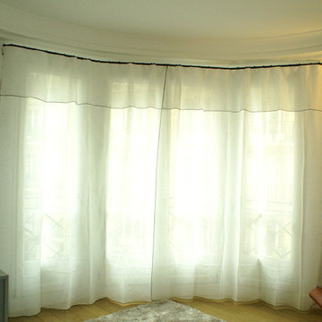 Rideaux et tringles sur mesure pour bow-window