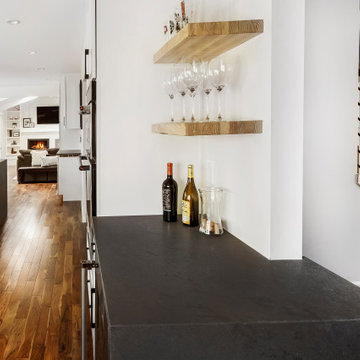 Beverage center between kitchen and living room