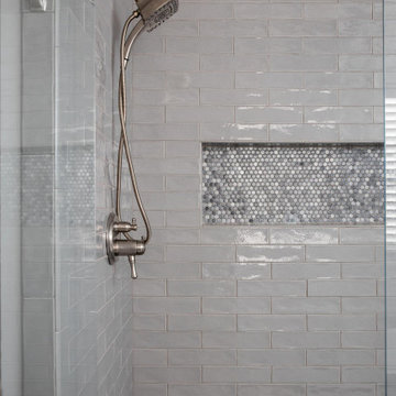 Tile Shower with Mosaic Accent Band and Handheld Sprayer