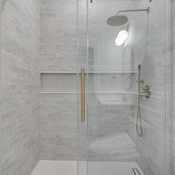 White Bathroom With Golden Finishes