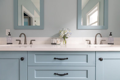 Inspiration for a master white tile and porcelain tile porcelain tile and double-sink shower bench remodel in Atlanta with shaker cabinets, blue cabinets, gray walls, an undermount sink, quartz countertops, a hinged shower door, white countertops and a built-in vanity