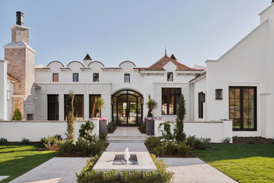 Inspiration for a large transitional exterior home remodel in Phoenix