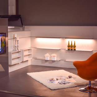 Inspiration for a small contemporary home theater remodel in Hamburg with gray walls and a projector screen