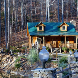 Quaint Log Home Located in Pigeon Forge Tennessee - Siding And Stone Veneer