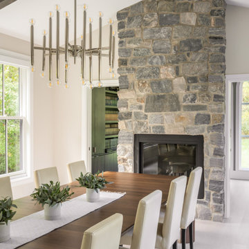 Warm Modern Dining Room with Stone Fireplace