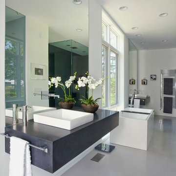Master Bath with Floating Vanity and Free Standing Tub