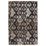 Jaipur Living - Nikki Chu by Jaipur Living Livio Ikat Black/Tan Area Rug 9'6"x12'7" - Inspired by the African motifs, the Sanaa collection by Nikki Chu is the perfect combination of statement-making patterns and easy-to-decorate-with hues. The Livio rug boasts a perfectly distressed ikat-inspired design in tones of black, gray, tan, beige, and hints of pink. Ivory fringe trim adds texture and vintage allure. This power-loomed rug features a plush and durable blend of polyester and polypropylene, lending the ideal accent to high-traffic spaces.