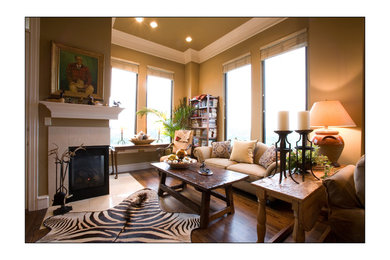 Living room - large modern formal and loft-style dark wood floor living room idea in Dallas with beige walls, a standard fireplace and a plaster fireplace