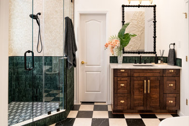 Bathroom - mid-sized transitional master green tile and marble tile marble floor, multicolored floor and single-sink bathroom idea in Austin with shaker cabinets, white walls, an undermount sink, quartz countertops, a hinged shower door, white countertops, a built-in vanity and dark wood cabinets